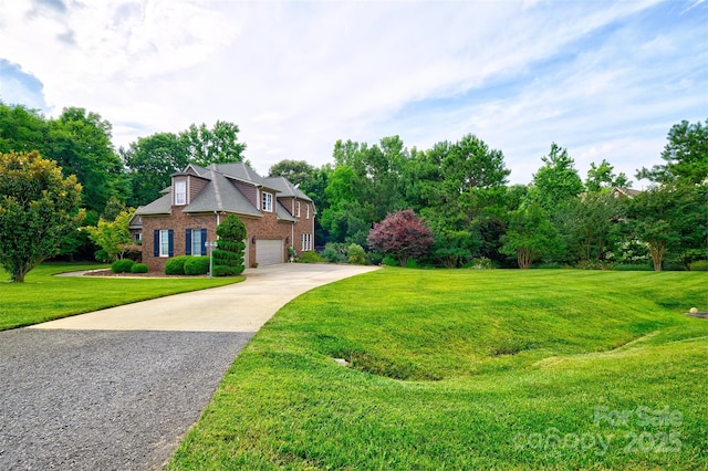 5826 Natoma Rd, Lake Wylie, SC 29710 - view of front of house featuring concrete driveway, a garage, brick siding, and a front lawn