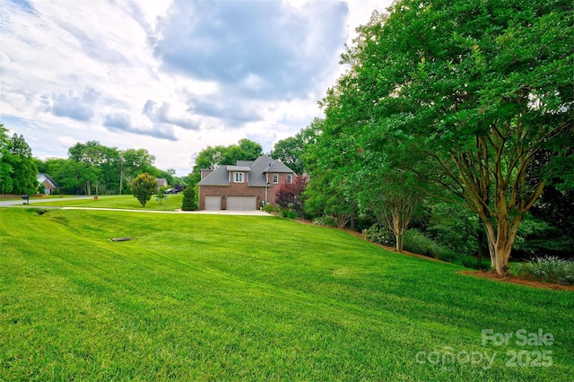 5826 Natoma Rd, Lake Wylie, SC 29710 - view of green lawn with an attached garage