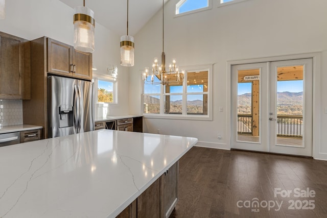 203 Boleyn Dr, Black Mountain, NC 28711 - kitchen featuring stainless steel fridge with ice dispenser, french doors, plenty of natural light, and high vaulted ceiling