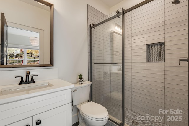 203 Boleyn Dr, Black Mountain, NC 28711 - full bathroom with a shower stall, toilet, and vanity
