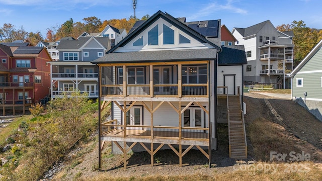 203 Boleyn Dr, Black Mountain, NC 28711 - rear view of property featuring french doors, a residential view, roof with shingles, and a sunroom