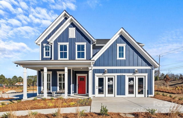 view of front of home with board and batten siding and a porch