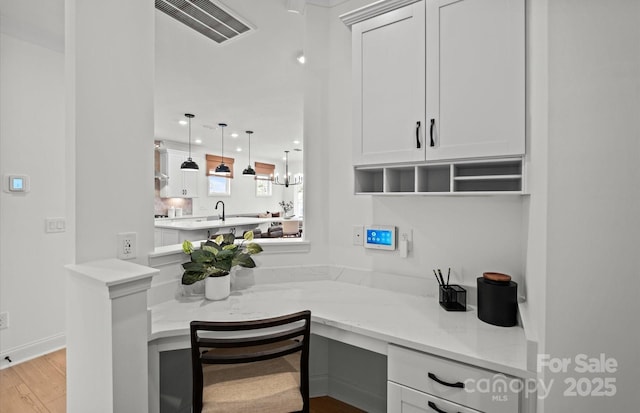 bathroom with wood finished floors