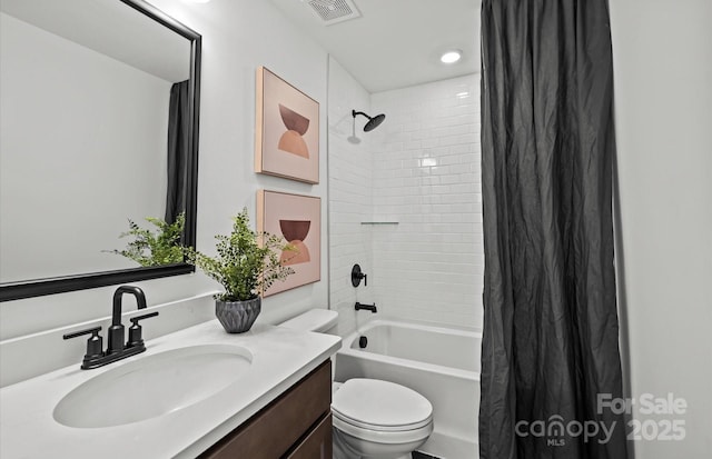 full bathroom with shower / tub combo, toilet, and vanity