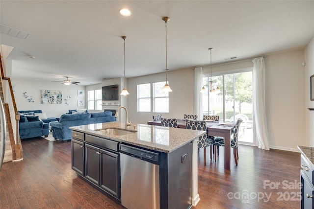 1553 Arcadia Bluff Dr, York, SC 29745 - kitchen featuring stainless steel dishwasher, healthy amount of natural light, a sink, dark wood finished floors, and recessed lighting