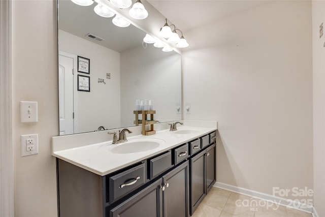 1553 Arcadia Bluff Dr, York, SC 29745 - bathroom featuring tile patterned flooring, double vanity, and baseboards