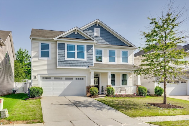 1553 Arcadia Bluff Dr, York, SC 29745 - craftsman-style home featuring a porch, concrete driveway, and an attached garage