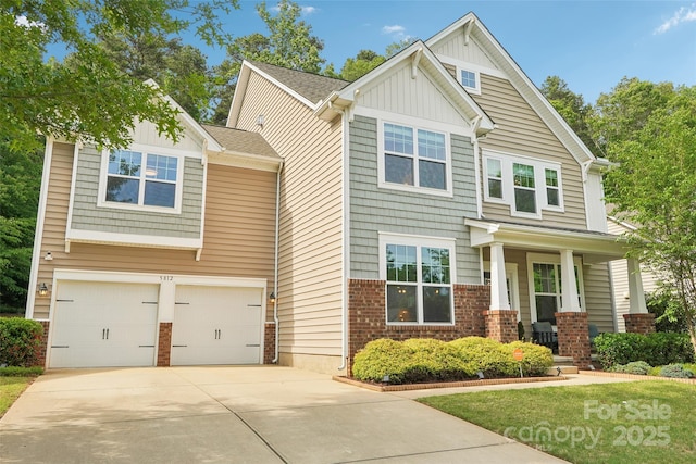 5812 Dinsmore Ln, Belmont, NC 28012 - craftsman inspired home with board and batten siding, a garage, driveway, covered porch, and brick siding