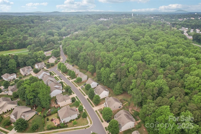 5812 Dinsmore Ln, Belmont, NC 28012 - aerial perspective of suburban area featuring a heavily wooded area