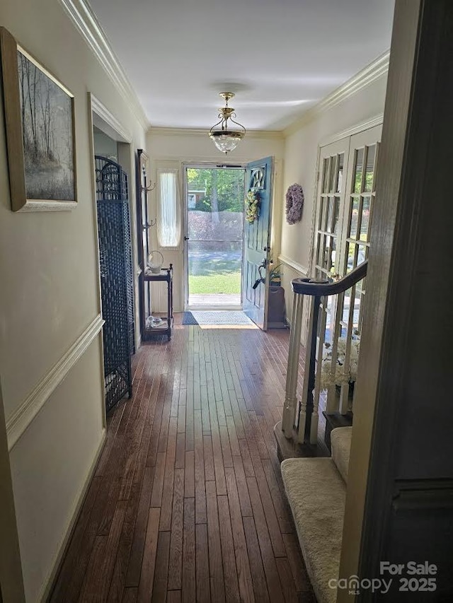 100 Boros Lndg, New Bern, NC 28560 - entryway with dark wood-style floors, crown molding, a chandelier, french doors, and stairway