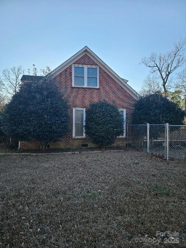 100 Boros Lndg, New Bern, NC 28560 - view of home's exterior with fence and brick siding