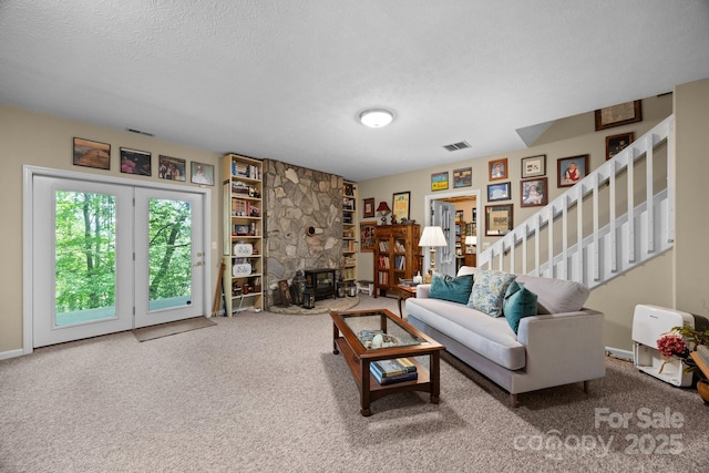 81 Corbin Shady Ln, Waynesville, NC 28785 - living area featuring stairway, a textured ceiling, and carpet