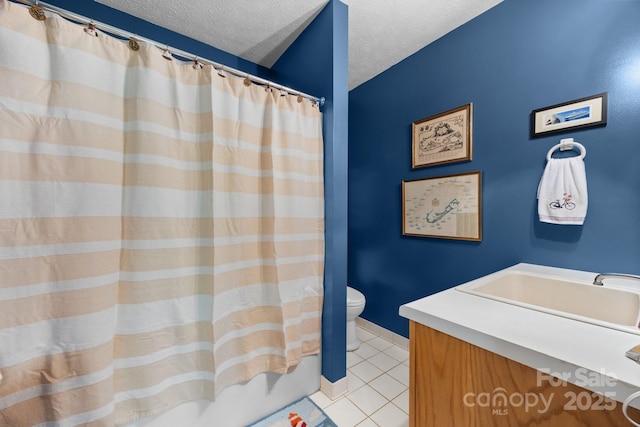 81 Corbin Shady Ln, Waynesville, NC 28785 - bathroom featuring tile patterned floors, toilet, a textured ceiling, vanity, and a shower with shower curtain