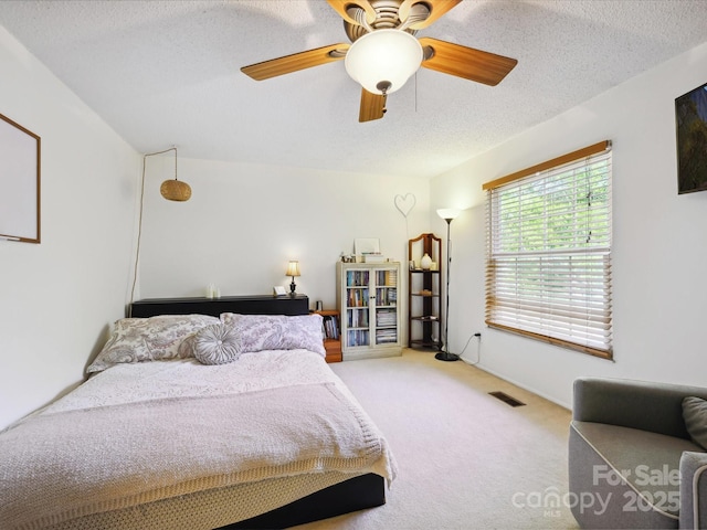 11718 Battery Pl, Charlotte, NC 28273 - bedroom featuring carpet floors, a textured ceiling, and ceiling fan