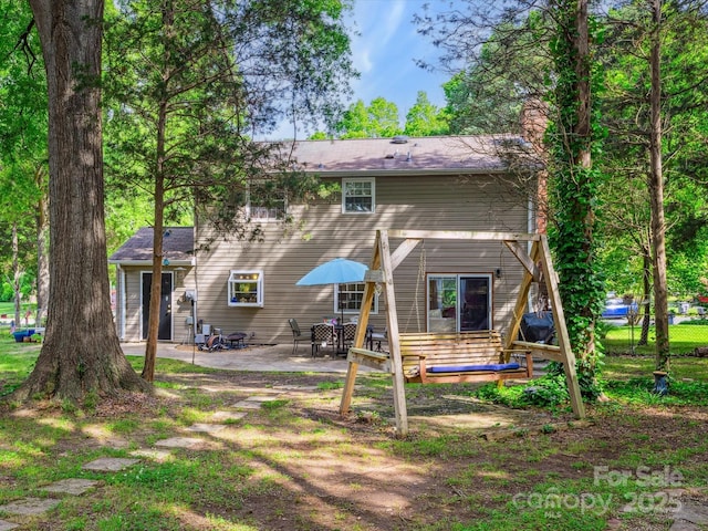 11718 Battery Pl, Charlotte, NC 28273 - rear view of property with a patio and fence