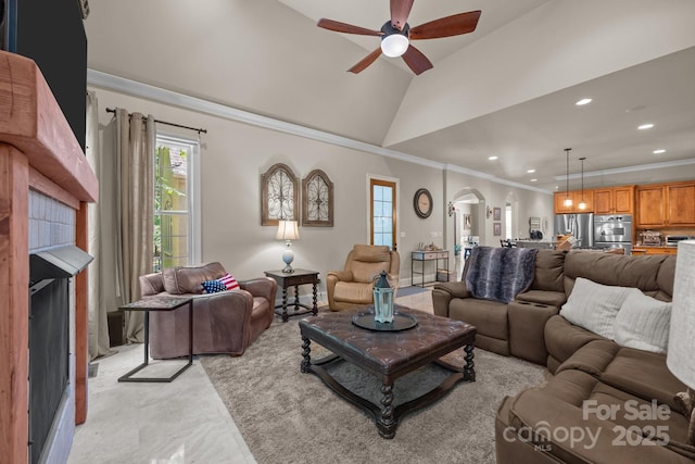 104 Golden Bell Ct, Mooresville, NC 28117 - living area with a ceiling fan, recessed lighting, ornamental molding, arched walkways, and vaulted ceiling