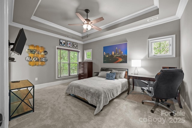 104 Golden Bell Ct, Mooresville, NC 28117 - bedroom with a raised ceiling, multiple windows, crown molding, baseboards, and a desk