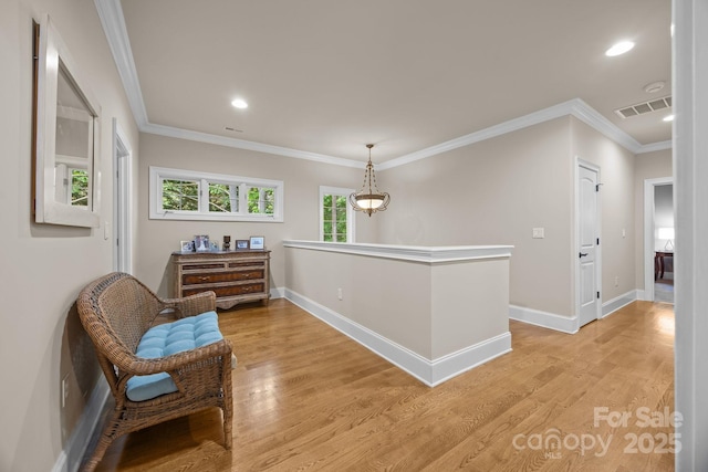 104 Golden Bell Ct, Mooresville, NC 28117 - hallway featuring light wood-style flooring, crown molding, baseboards, recessed lighting, and an upstairs landing