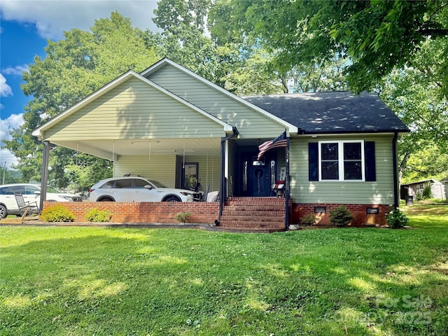 312 Shady Ln, Lincolnton, NC 28092 - view of front facade with a front lawn, covered porch, a carport, and roof with shingles