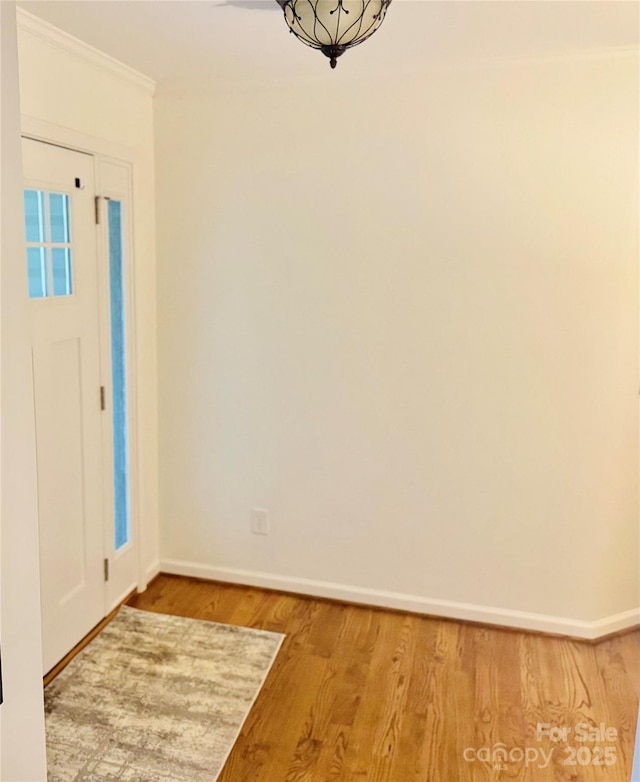 312 Shady Ln, Lincolnton, NC 28092 - foyer with wood finished floors, baseboards, and crown molding