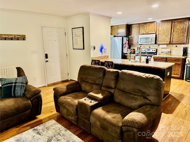 312 Shady Ln, Lincolnton, NC 28092 - living area featuring ornamental molding, light wood-style flooring, recessed lighting, and baseboards