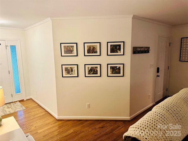 312 Shady Ln, Lincolnton, NC 28092 - foyer entrance featuring wood finished floors, baseboards, and ornamental molding