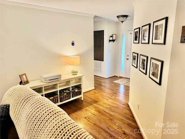 312 Shady Ln, Lincolnton, NC 28092 - hallway featuring crown molding, wood finished floors, and baseboards
