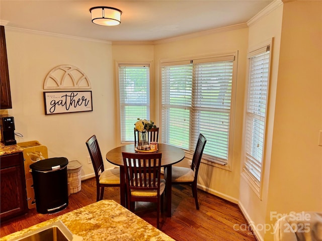 312 Shady Ln, Lincolnton, NC 28092 - dining space featuring wood finished floors, baseboards, healthy amount of natural light, and ornamental molding