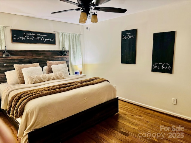 312 Shady Ln, Lincolnton, NC 28092 - bedroom with baseboards, wood finished floors, and ceiling fan