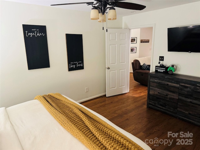 312 Shady Ln, Lincolnton, NC 28092 - bedroom with wood finished floors, a ceiling fan, and baseboards