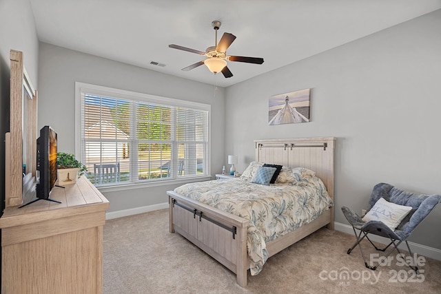 4532 Stellata Loop, Sherrills Ford, NC 28673 - bedroom featuring baseboards, light carpet, and ceiling fan