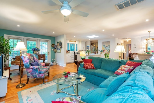 212 Vance Ave, Black Mountain, NC 28711 - living room with light wood finished floors, recessed lighting, a ceiling fan, and baseboards