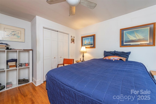 212 Vance Ave, Black Mountain, NC 28711 - bedroom with wood finished floors, a ceiling fan, and a closet
