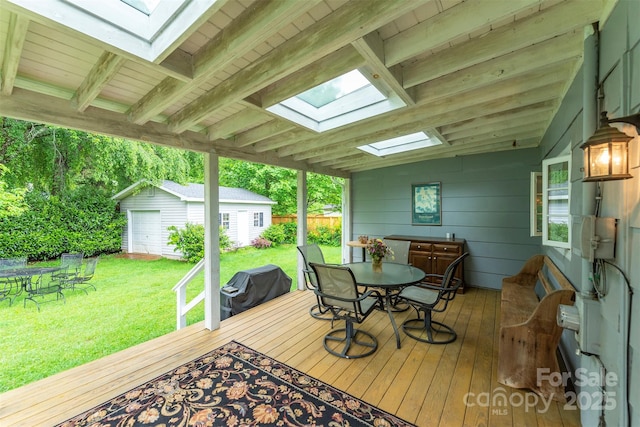 212 Vance Ave, Black Mountain, NC 28711 - wooden deck featuring outdoor dining space, an outbuilding, grilling area, and a yard