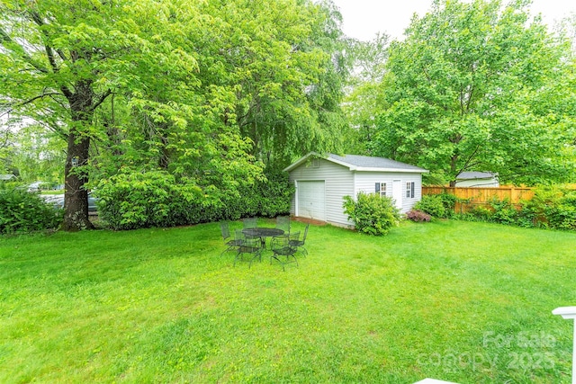 212 Vance Ave, Black Mountain, NC 28711 - view of yard featuring an outdoor structure and a garage