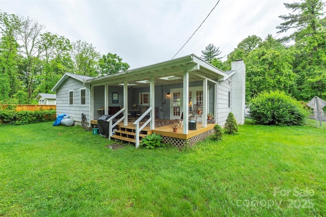 212 Vance Ave, Black Mountain, NC 28711 - back of house featuring a chimney and a wooden deck