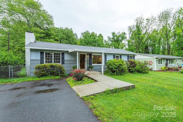 212 Vance Ave, Black Mountain, NC 28711 - ranch-style house with a chimney and a shingled roof