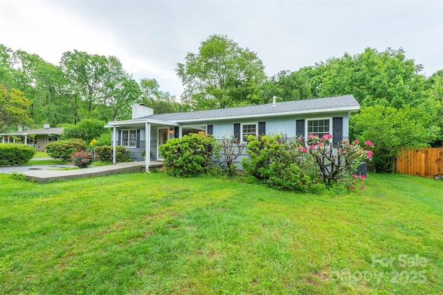 212 Vance Ave, Black Mountain, NC 28711 - ranch-style house featuring a chimney and covered porch