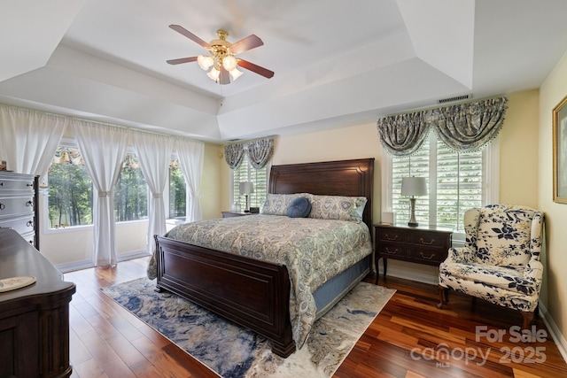 408 Emerald Bay Dr, Salisbury, NC 28146 - bedroom with a tray ceiling, access to outside, wood finished floors, and a ceiling fan
