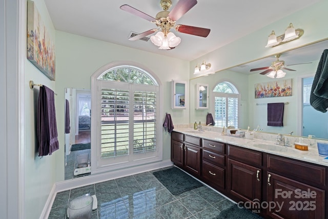 408 Emerald Bay Dr, Salisbury, NC 28146 - full bathroom featuring ceiling fan, double vanity, baseboards, and tile patterned flooring