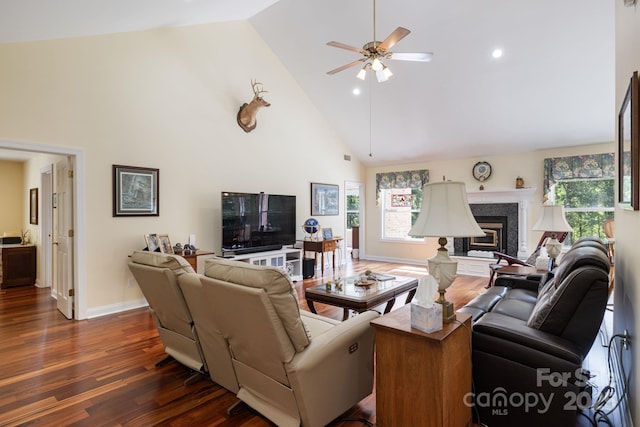 408 Emerald Bay Dr, Salisbury, NC 28146 - living room featuring high vaulted ceiling, dark wood-type flooring, ceiling fan, baseboards, and a glass covered fireplace