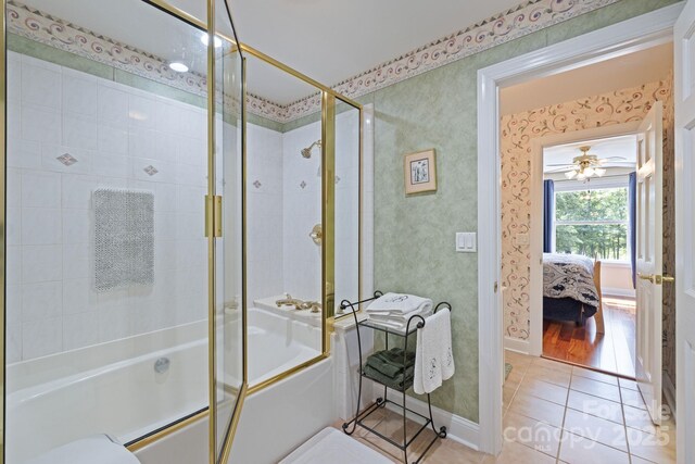 408 Emerald Bay Dr, Salisbury, NC 28146 - ensuite bathroom with combined bath / shower with glass door, tile patterned flooring, and baseboards