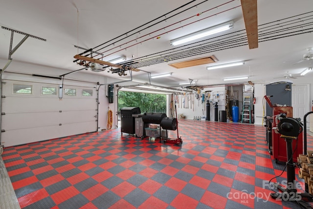 408 Emerald Bay Dr, Salisbury, NC 28146 - garage featuring a garage door opener and a central vacuum unit