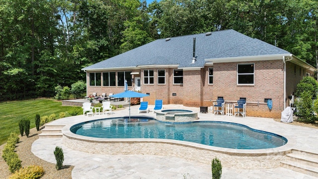 408 Emerald Bay Dr, Salisbury, NC 28146 - view of swimming pool featuring a patio, a pool with connected hot tub, a sunroom, and view of scattered trees
