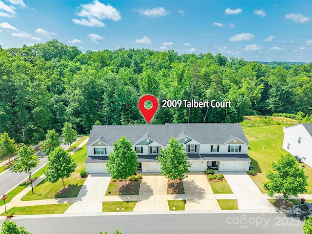2009 Talbert Ct, Charlotte, NC 28214 - view of subject property featuring a heavily wooded area