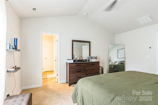 2009 Talbert Ct, Charlotte, NC 28214 - bedroom with lofted ceiling, light carpet, baseboards, and ensuite bath