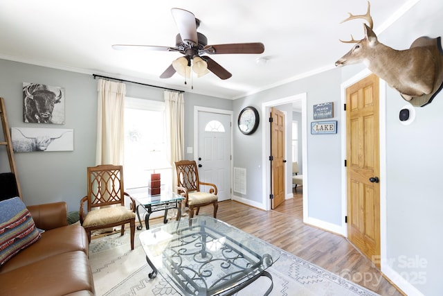 118 Sunset Dr, Clover, SC 29710 - living area with light wood-type flooring, crown molding, a ceiling fan, and baseboards