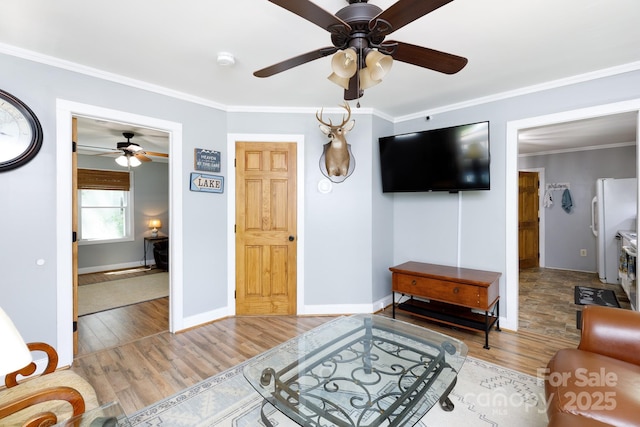 118 Sunset Dr, Clover, SC 29710 - living area with a ceiling fan, wood finished floors, crown molding, and baseboards