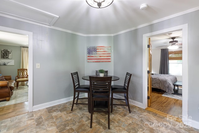 118 Sunset Dr, Clover, SC 29710 - dining space featuring attic access, stone finish floors, ornamental molding, and baseboards