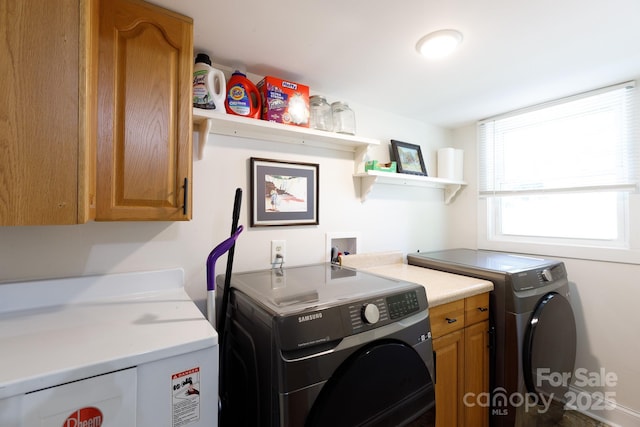118 Sunset Dr, Clover, SC 29710 - washroom featuring washer and dryer and cabinet space